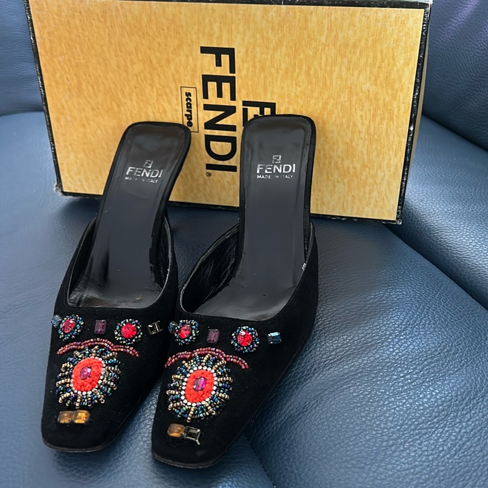 Fendi suede mules in  good used condition. Missing one stone in the front.